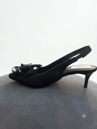 "Sparkle-ready white slingback heels with a crystal bow detail. Comfy kitten heel, timeless pointed toe. Shop bridal & nikah night must-haves now.